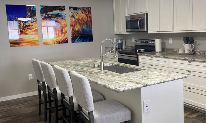 Wisconsin Rapids Apartment | Contemporary 1400 sq ft space in lower level Open concept gas burning fireplace