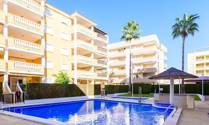 El Grau de Moncofa Apartment | Cosy apartment for 5 people with pool, WIFI, TV, terrace and pets allowed