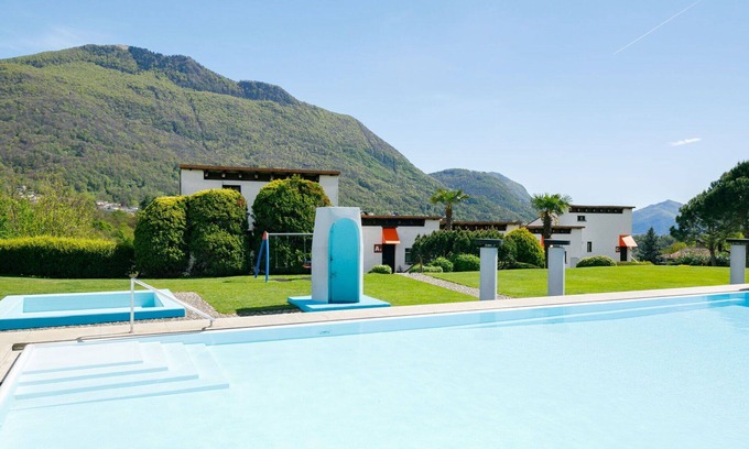 Capriasca Apartment | Cosy apartment for 5 people with pool, WIFI, TV, patio, pets allowed and panoramic view