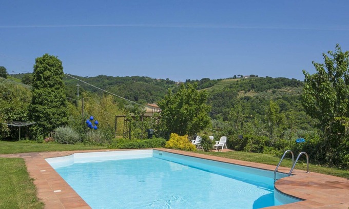 Giugnano Villa | Cosy apartment in villa for 4 guests with pool, A/C, WIFI, TV, terrace, panoramic view and parking