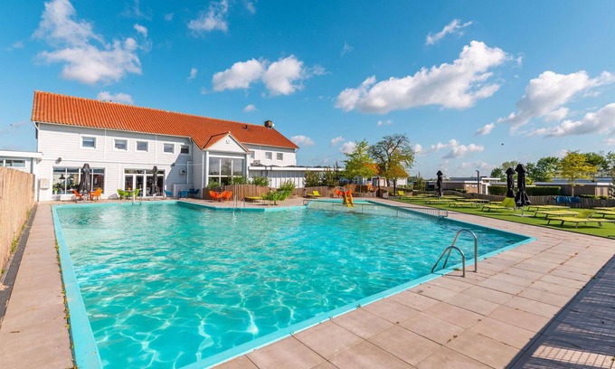Municipality of Nunspeet House | Cosy apartment in villa for 4 people with WIFI, pool, TV, terrace and parking