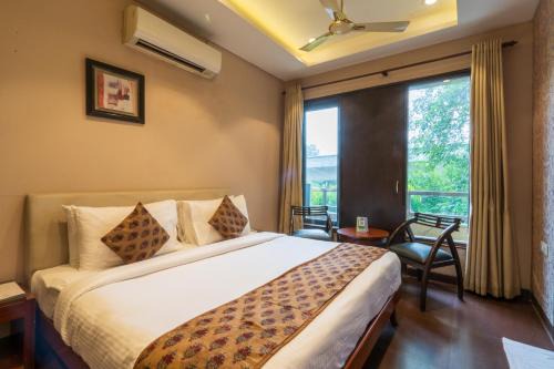 RK Puram Hotel | Cosy Grand, Chanakyapuri by The Cosy Hotels
