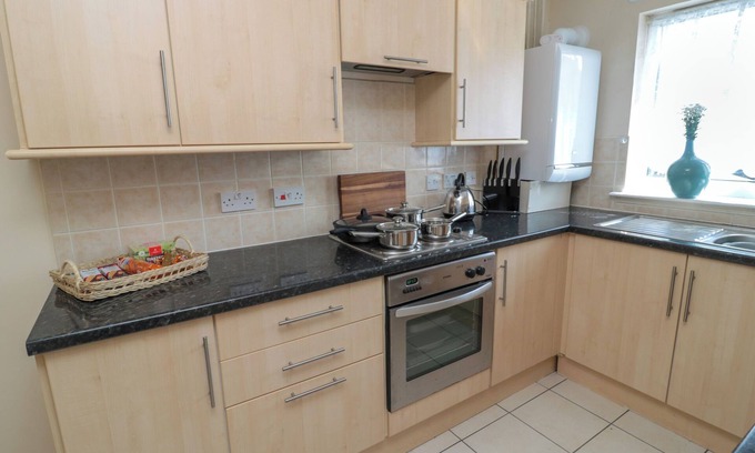 Woodhorn House | COSY NOOK, pet friendly, with a garden in Amble