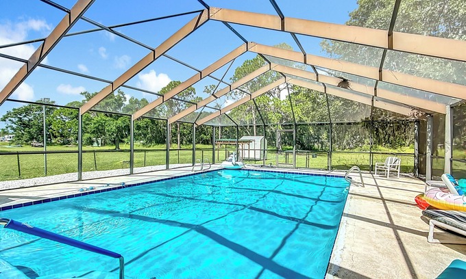 Florida South Atlantic Coast House | Cozy 3 BR home in charming Frostproof with caged saltwater pool. Boat ramp.