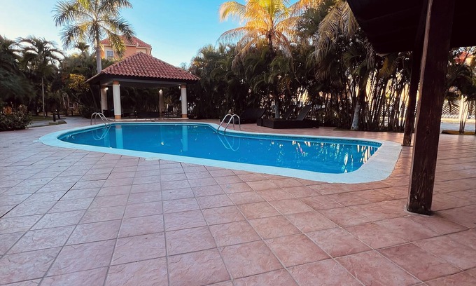 Punta Cana Apartment | Cozy Apartment, backyard & balcony pool first floor gated, electricity included.