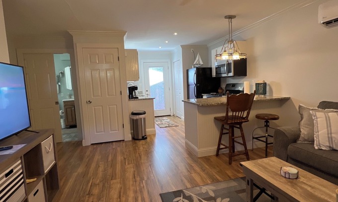Navarre House | Cozy cottage with private shaded patio and grilling area. Perfect Retreat!