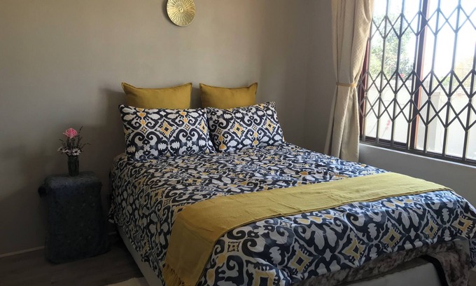 Greater Johannesburg Metropolitan Area House | Cozy Luxury.Bedroom with en-suite modern bathroom in a safe, peaceful location.