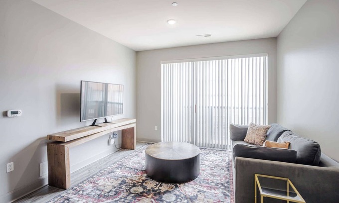 Central Business District Apartment | CozySuites at the Banks gym, pool 15