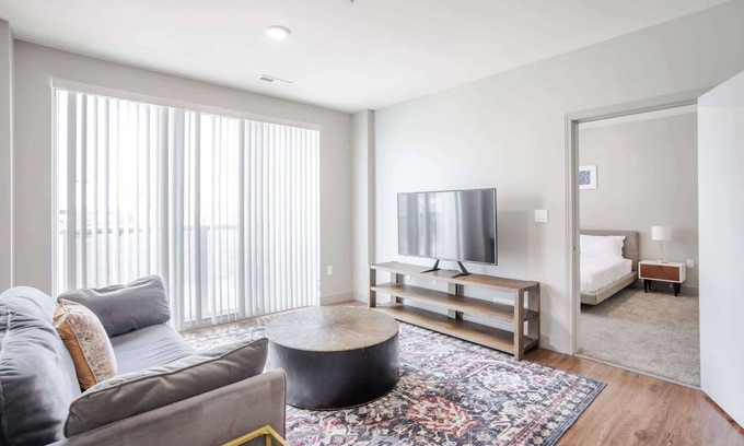 Central Business District Apartment | CozySuites at the Banks gym, pool 14
