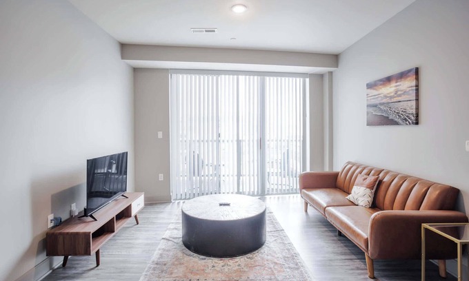Central Business District Apartment | CozySuites at the Banks gym, pool 12