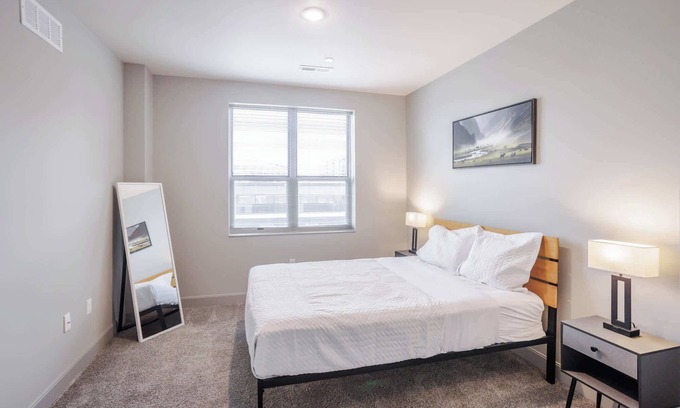 Central Business District Apartment | CozySuites at the Banks gym, pool 09