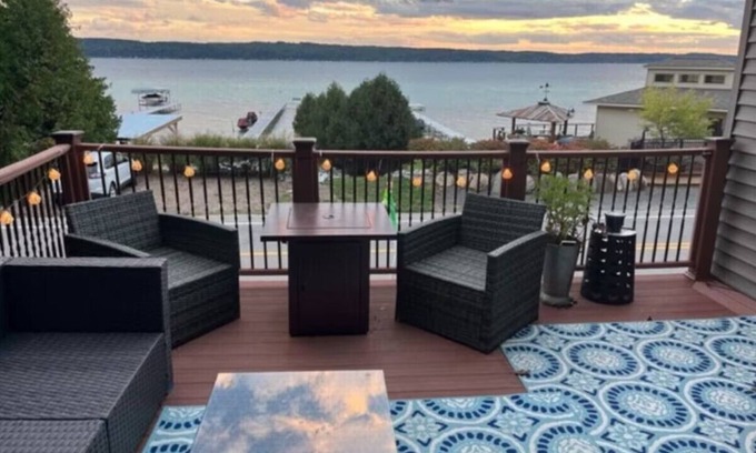 Lake Township House | Crystal Lake frontage, fire pit, kayaks, paddle boards, beach hut, AC, Dog ok