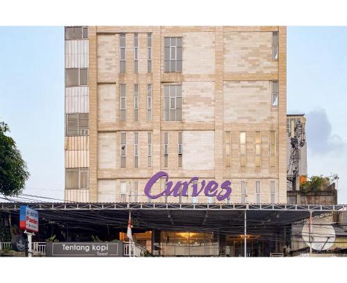 Kebayoran Lama Hotel | Curves Residence Mitra RedDoorz