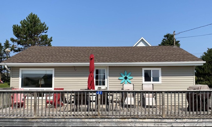 Victoria Cottage | Cute cottage with water view. Steps to a red sand beach on the South Shore.