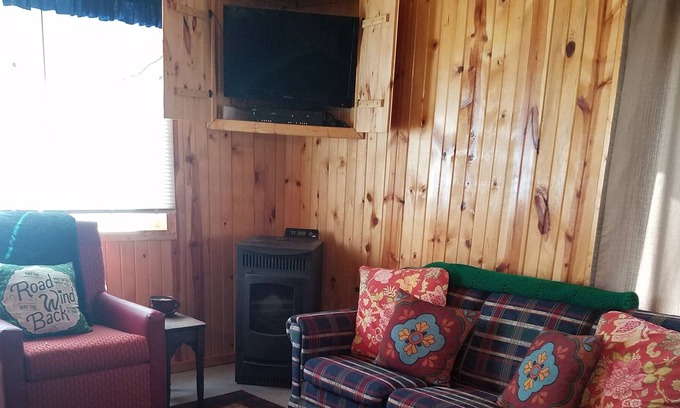 Mancelona Cottage | Cute, Quiet Cabin Getaway In The Woods! 200 FT to Snowmobile and ORV trail