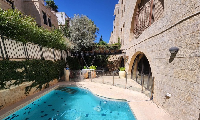 Jerusalem City Centre Apartment | David's Village with Pool & Patio for Families by FeelHome