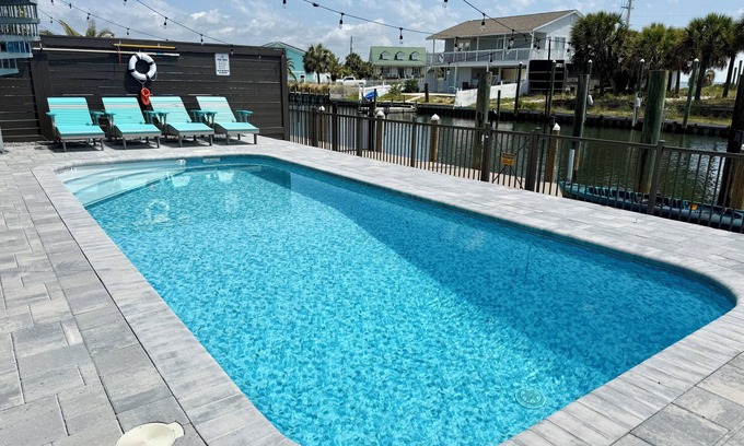 Navarre Beach House | "Delta Dawn" New Listing! Luxury Waterfront Home, Pool, Boat Dock