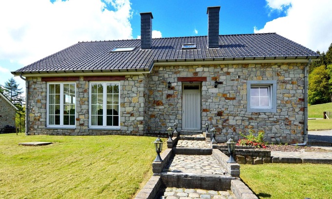 Trou de Bra House | Detached natural stone house with sunny garden and terrace, modern interior