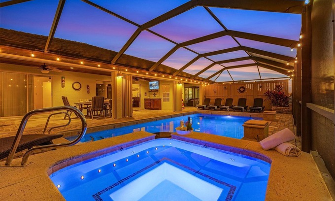 Fort Myers Villa | Direct Access Waterfront Villa with Heated Pool & Spa - Edgewater Escape - Roelens Vacations