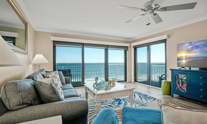 New Smyrna Beach Condo | Direct oceanfront condo with a large balcony and a heated beachfront pool