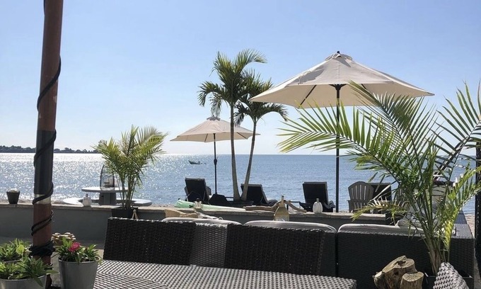 Milford House | Direct Waterfront "The Palms" Beach House