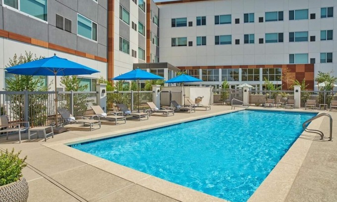 Williamsburg House | Discover Orlando's Magic from our 3 Stylish Accommodations! Outdoor Pool