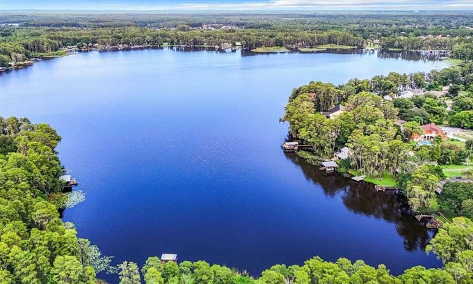 Land O' Lakes Cabin | Discover tucked away 5-bedroom lakefront cabin getaway in Land O' Lakes with AC