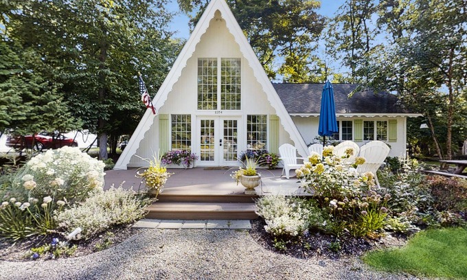 Charlevoix House | Dog-friendly A-frame home near beaches & downtown with firepit, deck, badminton