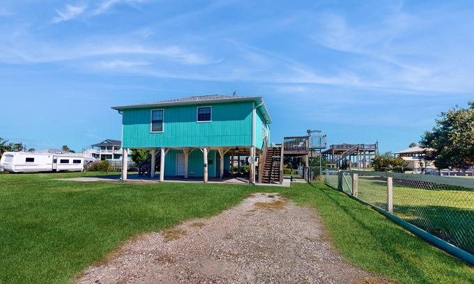 Crystal Beach House | Dog-friendly, canal-front home with boat ramp, dock, large yard, WiFi, & AC