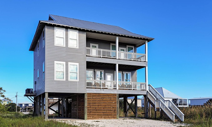 Fort Morgan House | Dog friendly home with shared pool, hot tub and private washer and dryer