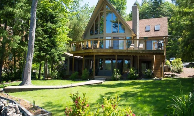 Moultonborough House | Dog-friendly lakefront home with private dock & beach, sauna, kayak, row boat