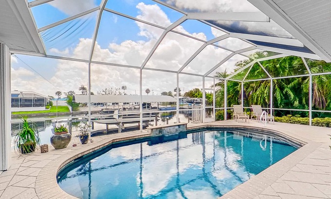 Matlacha Isles House | Dog-friendly waterfront home with heated pool, lanai, central AC, & W/D