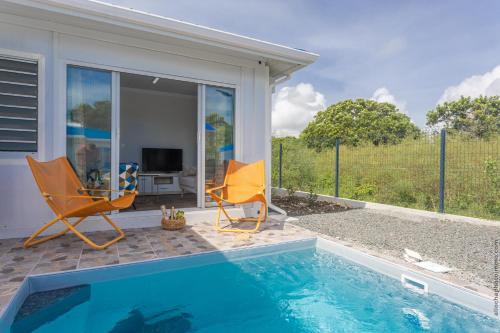 Saint-Francois House | Domaine "Alizé Sainte-Marthe" - Idéal Couple & Famille - Piscine Privée - Clim - Mini Green de Golf - Wifi HD - Calme - 5min St-François Centre - Draps & Serviettes fournies