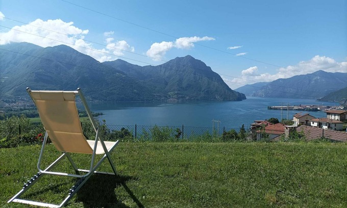 Costa Volpino Villa | Domus Bianca Single villa surrounded by greenery with a wide view of Lake Iseo