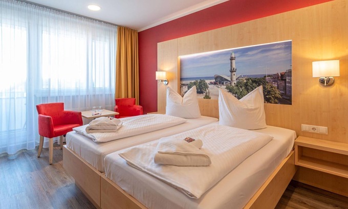 Sudstadt House | Doppelzimmer mit Balkon - Das Hotel an der Stadthalle Rostock