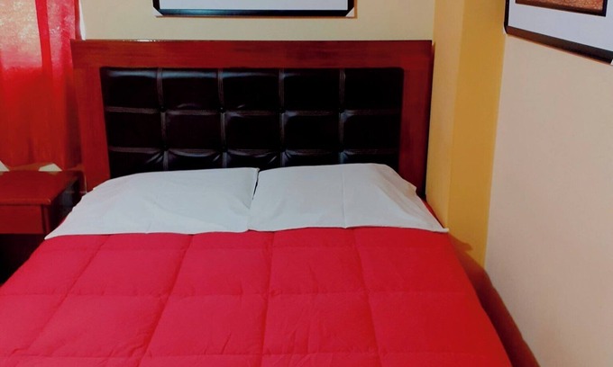 Cusco Historic Center Hotel | Double bedroom with private bathroom