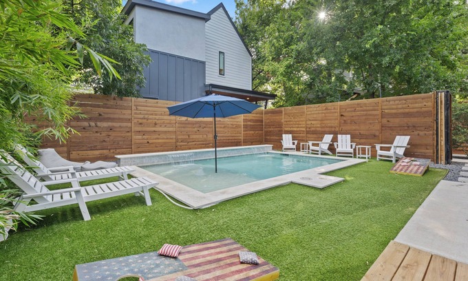 East Cesar Chavez House | Downtown Luxury Oasis - Heated Pool - 5 Bedrooms