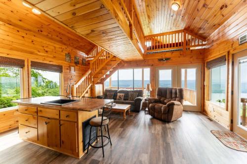 Bryant House | Eagles Nest Cabin with a private hot tub