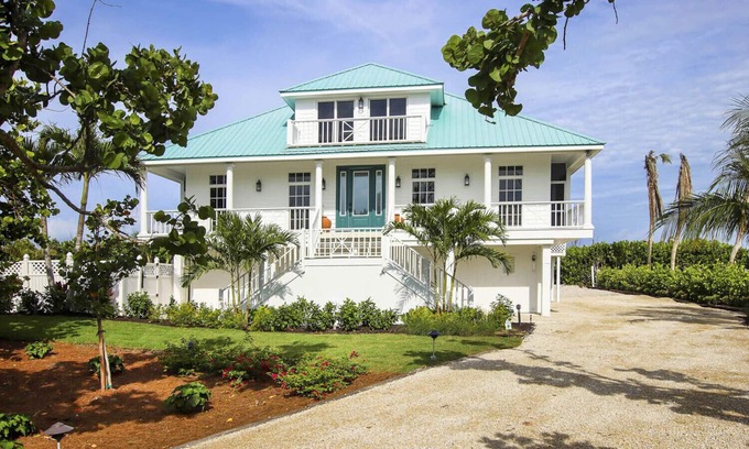 Wulfert House | Elegant 4-Bedroom Beachfront Estate with Private Pool & Spa