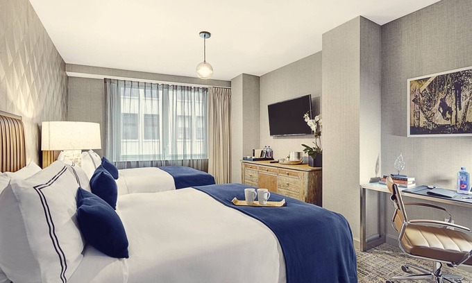 Financial District Hotel | Elegant and Spacious Room with Two Queen Beds for Ultimate Relaxation