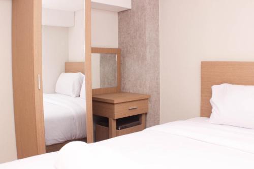 Jakarta Apartment | Elegant and Strategic Loft Studio Apple 1 Condovilla Apartment By Travelio