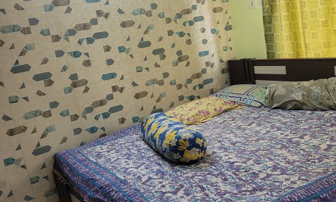 Thakurpukur Apartment | Elegant Spacious 2-bedroom AC Apartment balcony Kolkata Tollygunge~ pet friendly