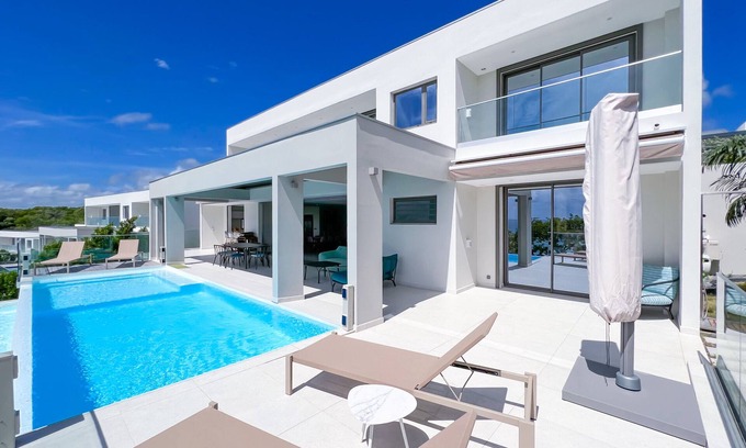 Anse des Rochers Villa | Elegant Villa with Pool Steps from the Beach