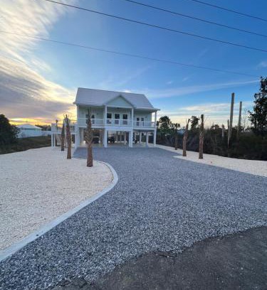 Port St. Joe Villa | Emerald Coast Retreat 2 4person golf carts large swim spa included