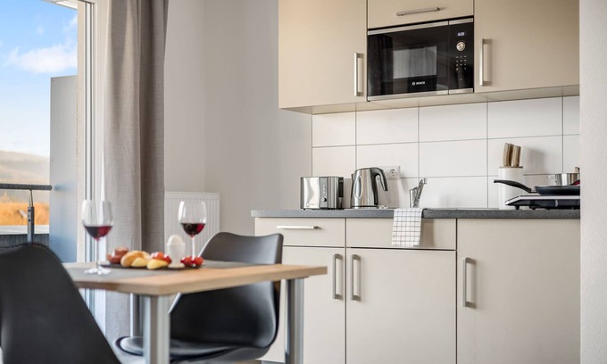 Denzlingen Apartment | EMPiRE: Marketplace | Balcony | Mountain view | Parking