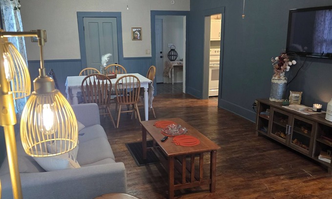 Herington House | Enchanted Cottage, located in Herington, KS with 1.5 bedrooms and a shaded yard