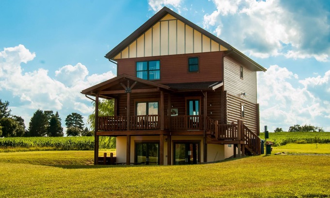 Geneva House | Enchanting, dog-friendly, lakeview home with a fireplace, game room, & fast WiFi