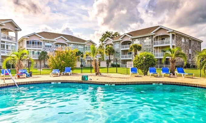 Central Myrtle Beach Condo | Endless Summer Updated Condo at Magnolia Place - Pool & Golf Course Views!