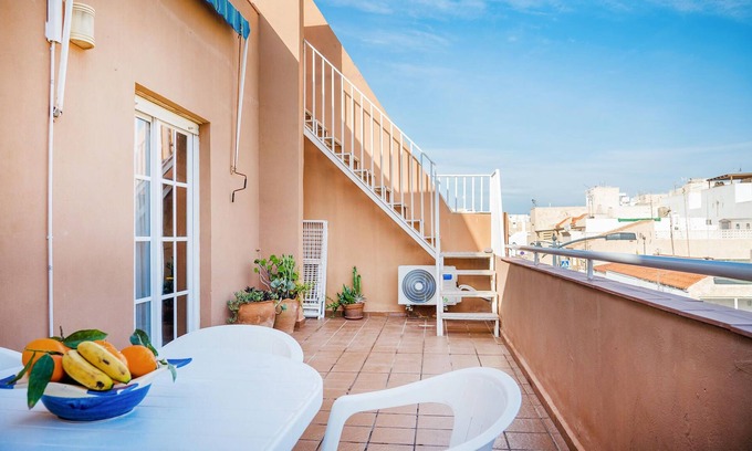 Pujaire House | Enjoy a relaxing getaway in this inviting beachfront vacation home.