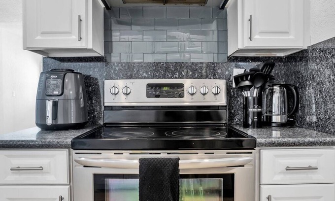 Birch Park Finger Streets House | Entire Lux Home ~ Heated Pool ~ 5 min walk to beach ~ Game Room ~ Bikes